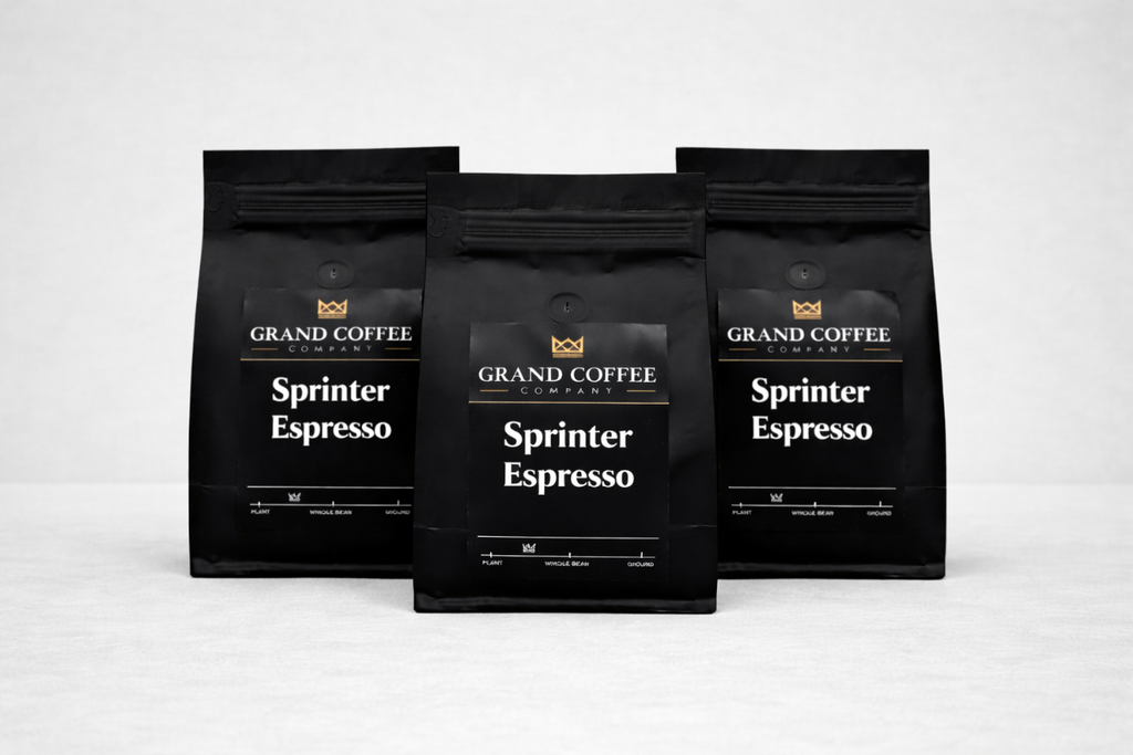 Three black coffee bags labeled 'Sprinter Espresso' from the Grand Coffee Company on a white background.