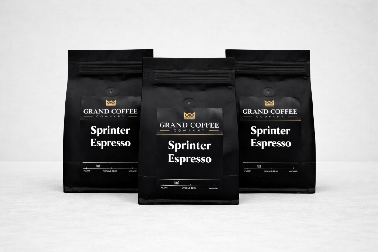 Three black coffee bags labeled 'Sprinter Espresso' from the Grand Coffee Company on a white background.